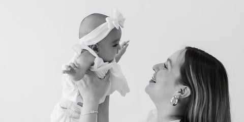 woman holding baby