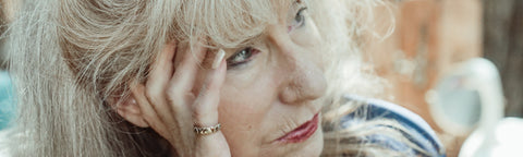 Older Woman looking off to her left