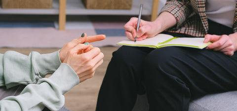 Anonymous women discussing treatment
