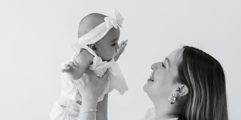 woman holding baby