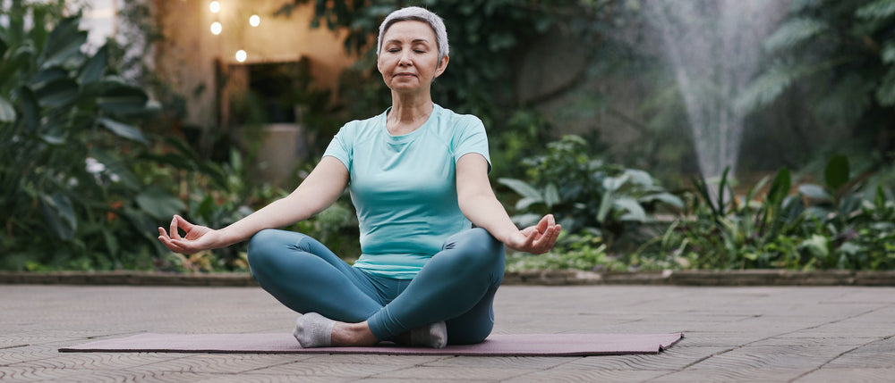 elder woman doing yoga